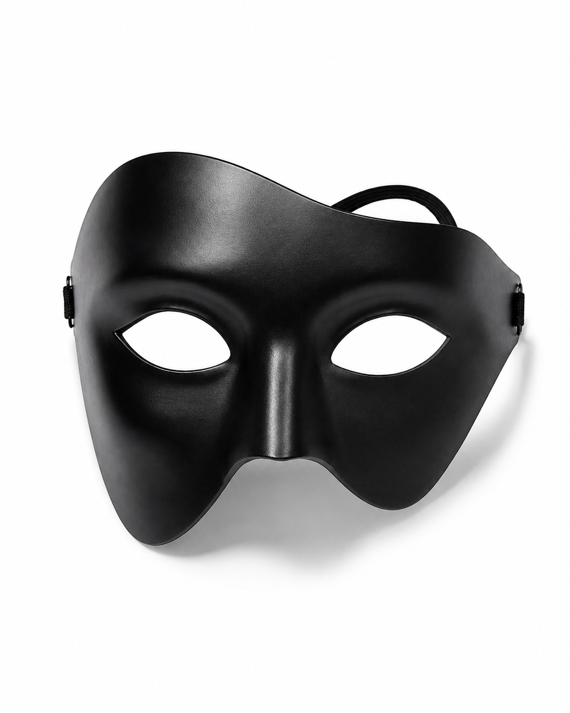 A matte black masquerade mask with eye cutouts and an adjustable strap, shown on a clean white background with a soft shadow.
