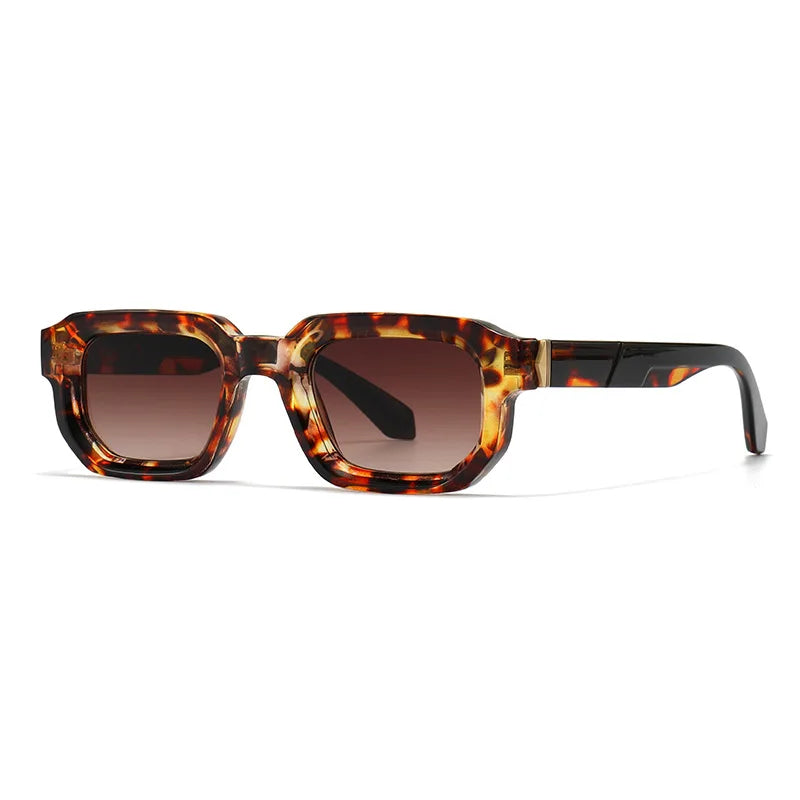 Sunglasses with tortoiseshell frame and brown gradient lenses on a white background